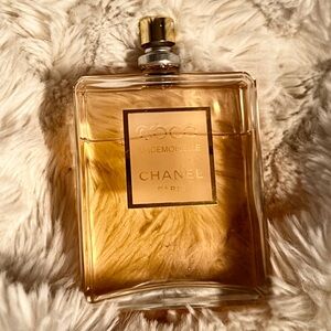 Coco Mademoiselle by Chanel, 3.4 oz used 3-4 times, however the lid was miplaced